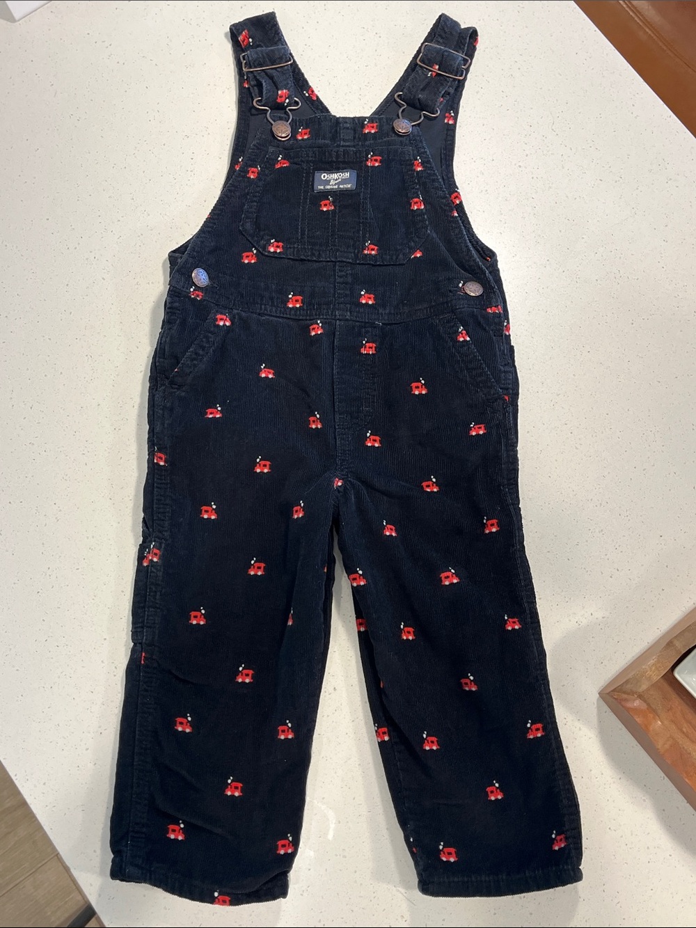 OshKosh B'gosh Black Corduroy Overalls with Red Train Motif